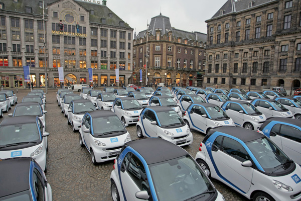Electric cars fill Dam Square car2Go’s Amsterdams launch 2011.